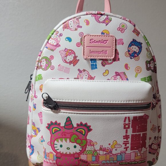 Hot Topic Handbags - Hello kitty loungefly mini backpack